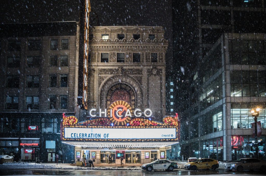 Photo of the Chicago Theater downtown on a snowy night