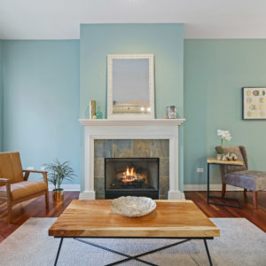Bright blue wall in a living room, an example of color theory in your home