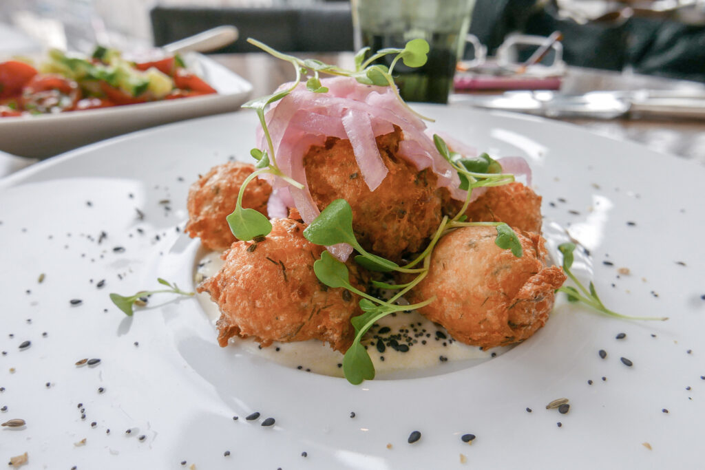 Smoked Salmon Beignets at NoMi Restaurant Chicago
