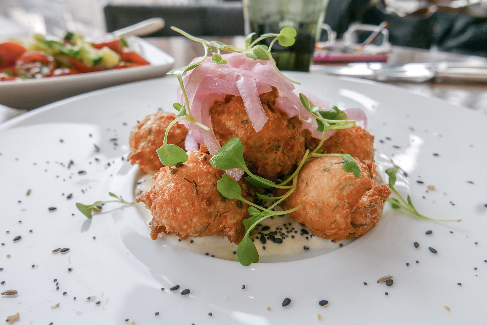 Smoked Salmon Beignets at NoMi Restaurant Chicago